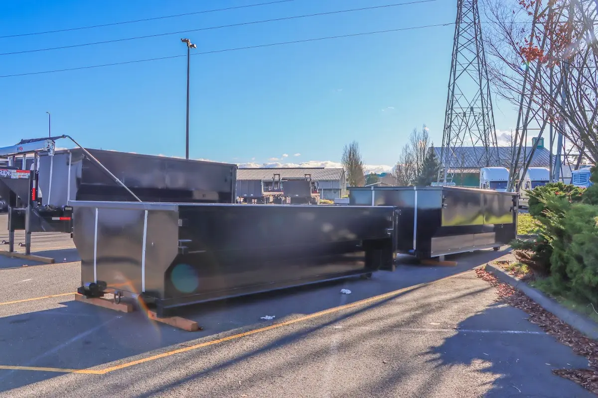 Roll-off dumpster ready for waste disposal at job site for 2 Yard Dumpster Rental in Discovery Bay